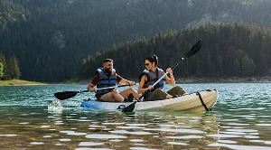 A couple kayaking on a lake. (Generated with AI)