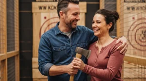 A couple holding an axe, on an axe throwing activity. (Generated with AI)