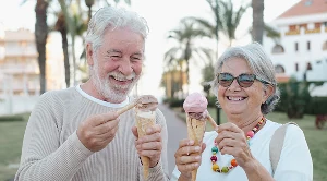 A couple enjoying ice cream together. (Generated with AI)